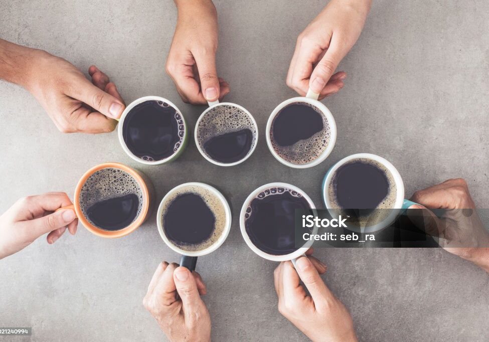 People hands holding cups of coffee